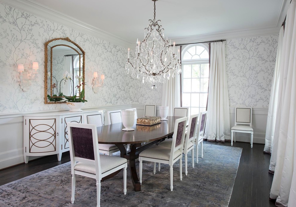 Traditional dining room in Dallas with white walls and dark hardwood floors.