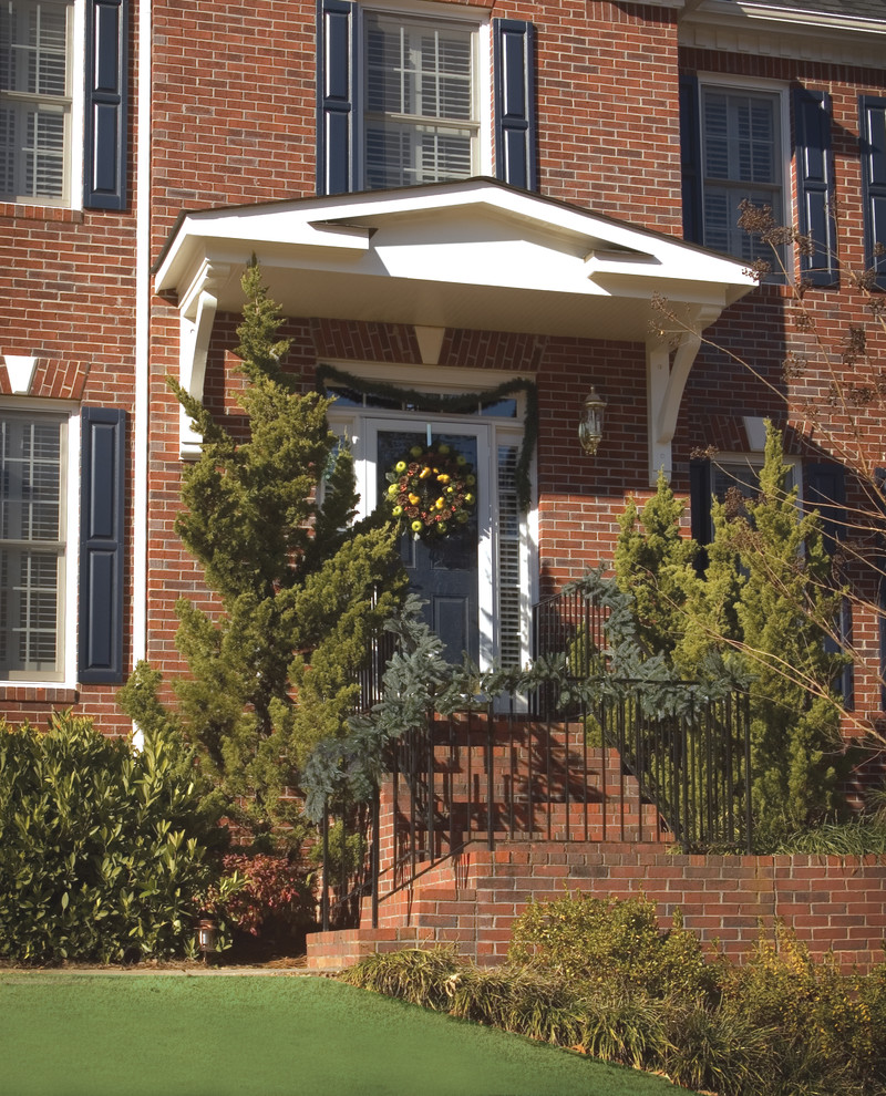 Photo of a small traditional front door in Atlanta with a single front door and a green front door.