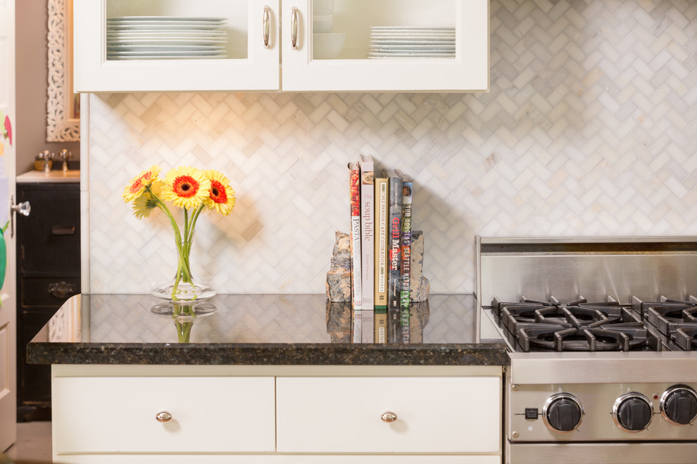 Large l-shaped light wood floor open concept kitchen photo in Seattle with flat-panel cabinets, white cabinets, wood countertops, gray backsplash, stainless steel appliances and an island