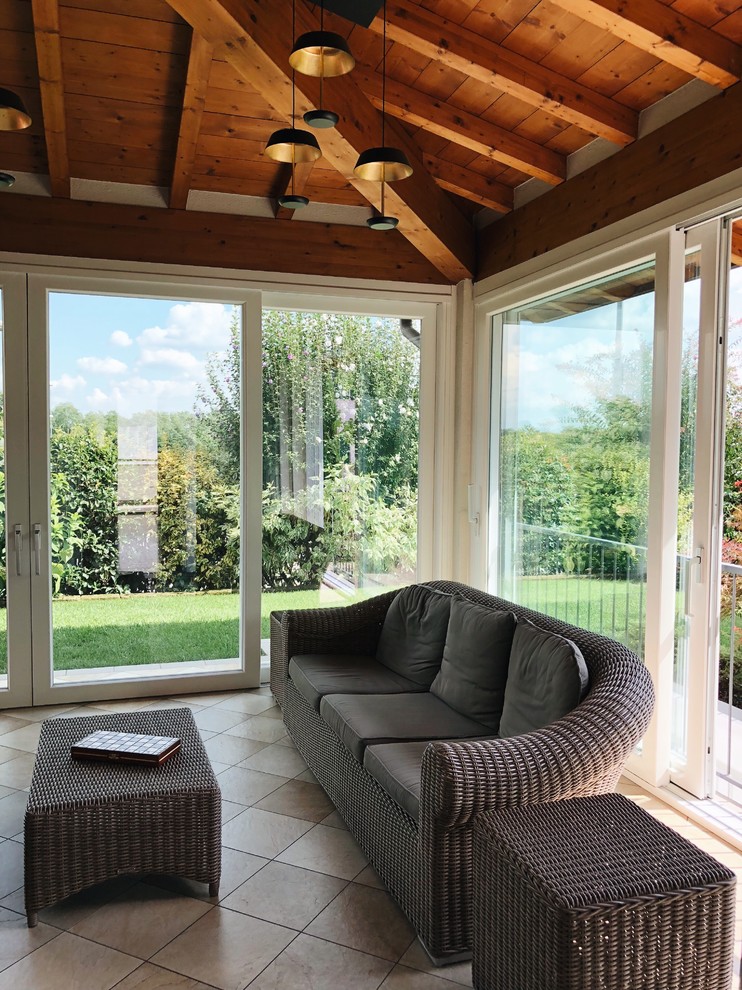 This is an example of a contemporary sunroom in Other.
