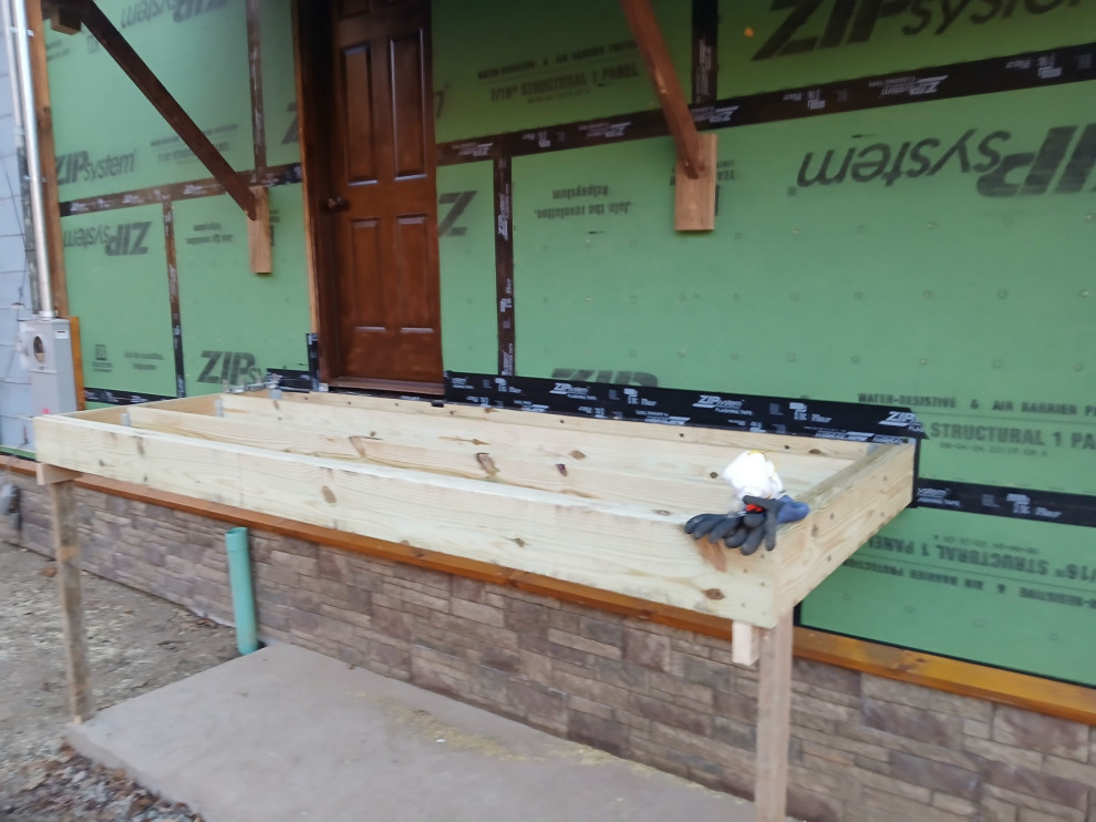 Log Siding, Stamped Concrete and Post and Beam Carport
