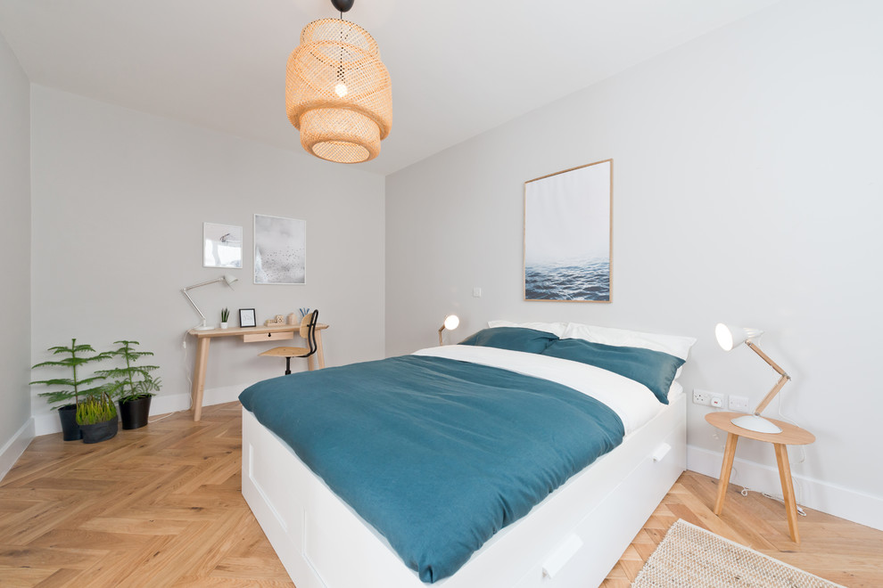 Design ideas for a scandinavian bedroom in Dublin.