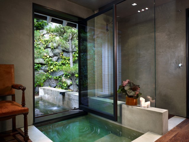 Inspiration for a large contemporary master bathroom in Seattle with a japanese tub, an open shower, grey walls and an open shower.