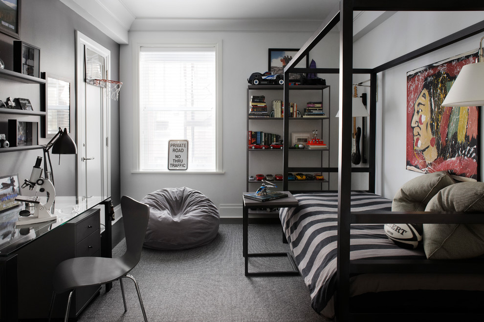 This is an example of a mid-sized transitional kids' room for boys in Chicago with white walls, dark hardwood floors, brown floor and recessed.