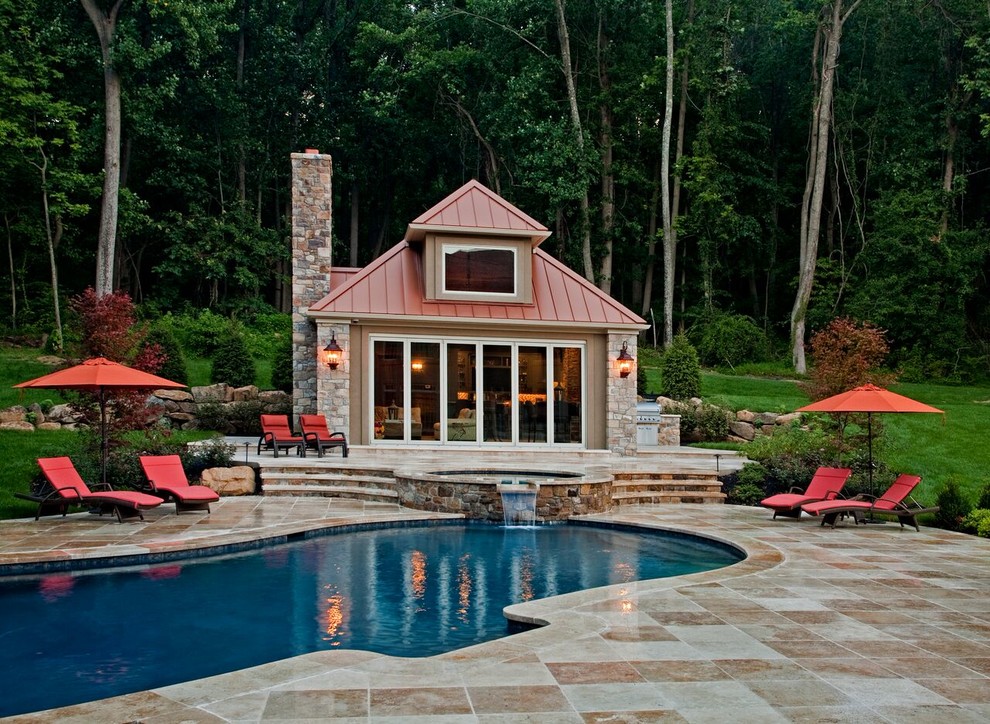 Inspiration for a large backyard stone and custom-shaped lap hot tub remodel in New York