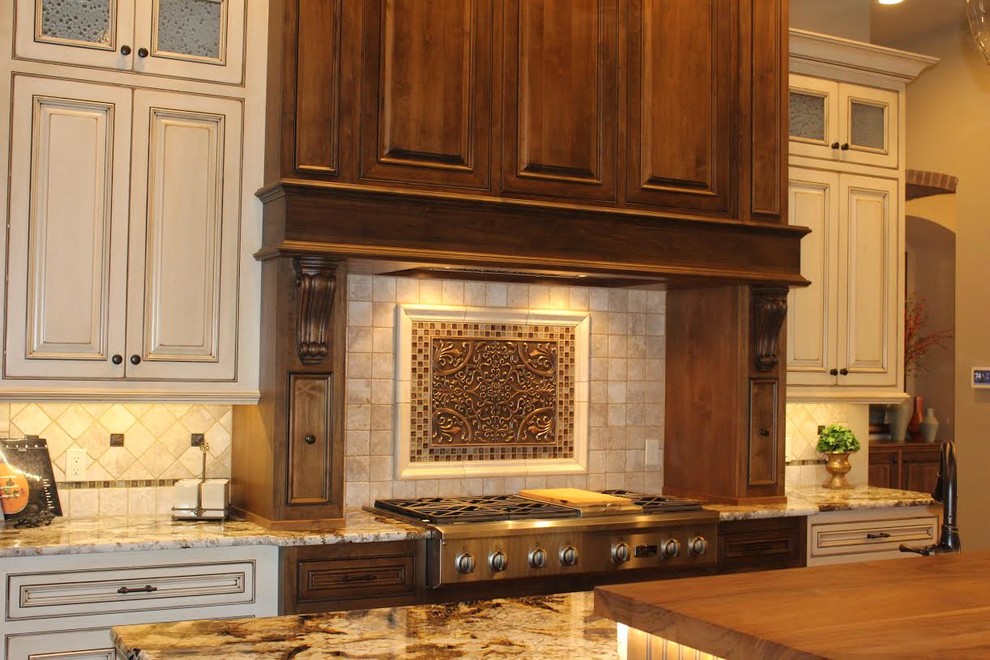 Example of a large transitional home design design