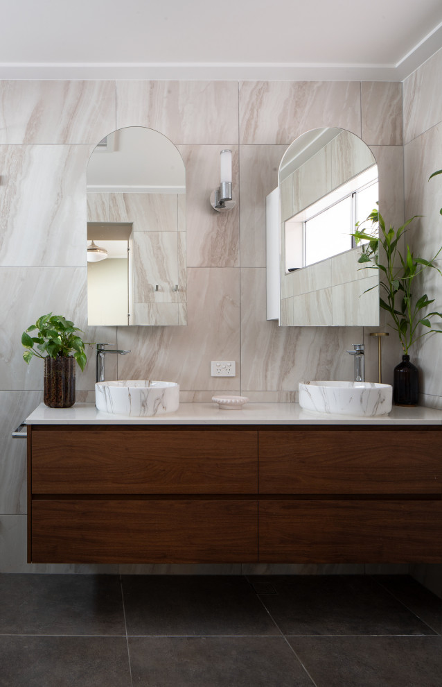 Photo of a small eclectic bathroom in Brisbane with white tile, ceramic floors, engineered quartz benchtops, grey floor, white benchtops, a double vanity and a floating vanity.