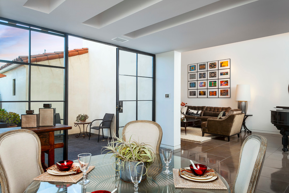 This is an example of a contemporary dining room in Santa Barbara.