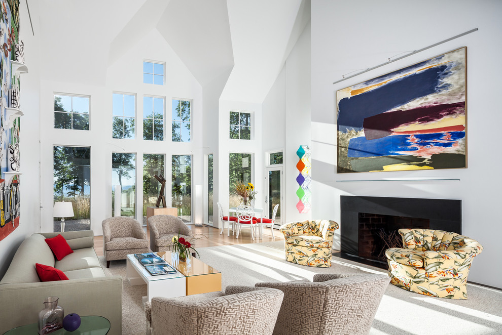 Large contemporary formal open concept living room in DC Metro with white walls, carpet and a ribbon fireplace.