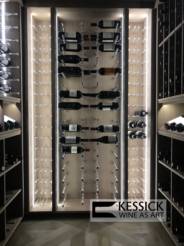 This is an example of a contemporary wine cellar in Other.