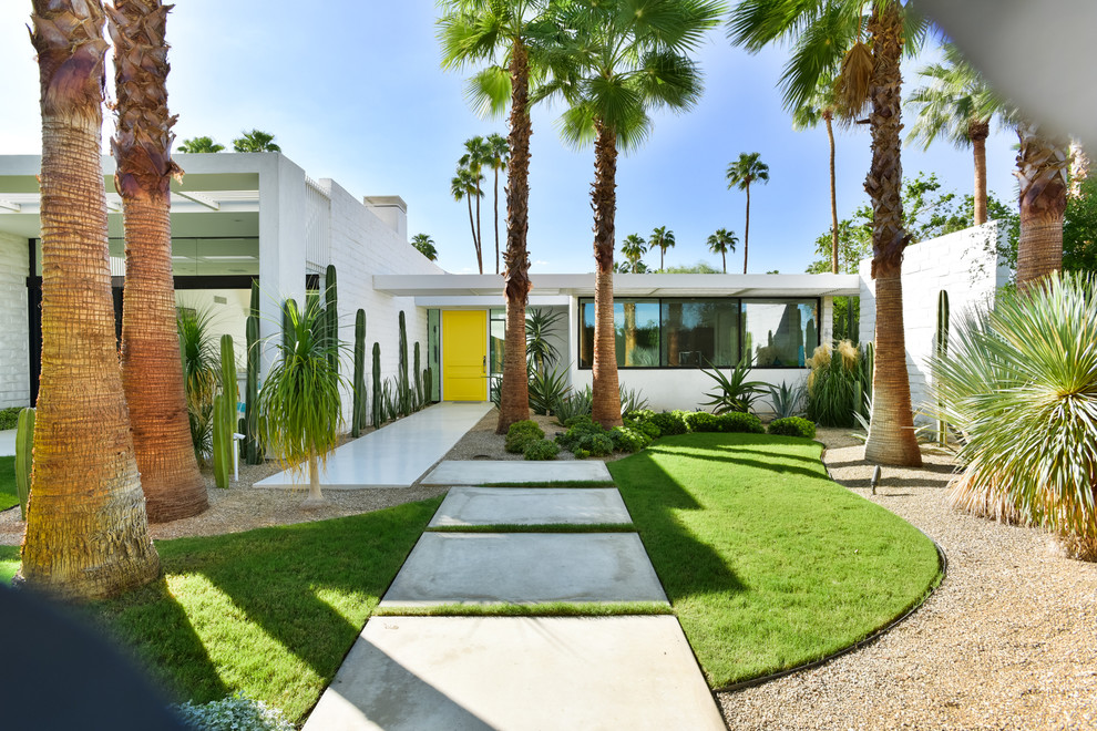Inspiration for a 1950s white one-story flat roof remodel in Los Angeles