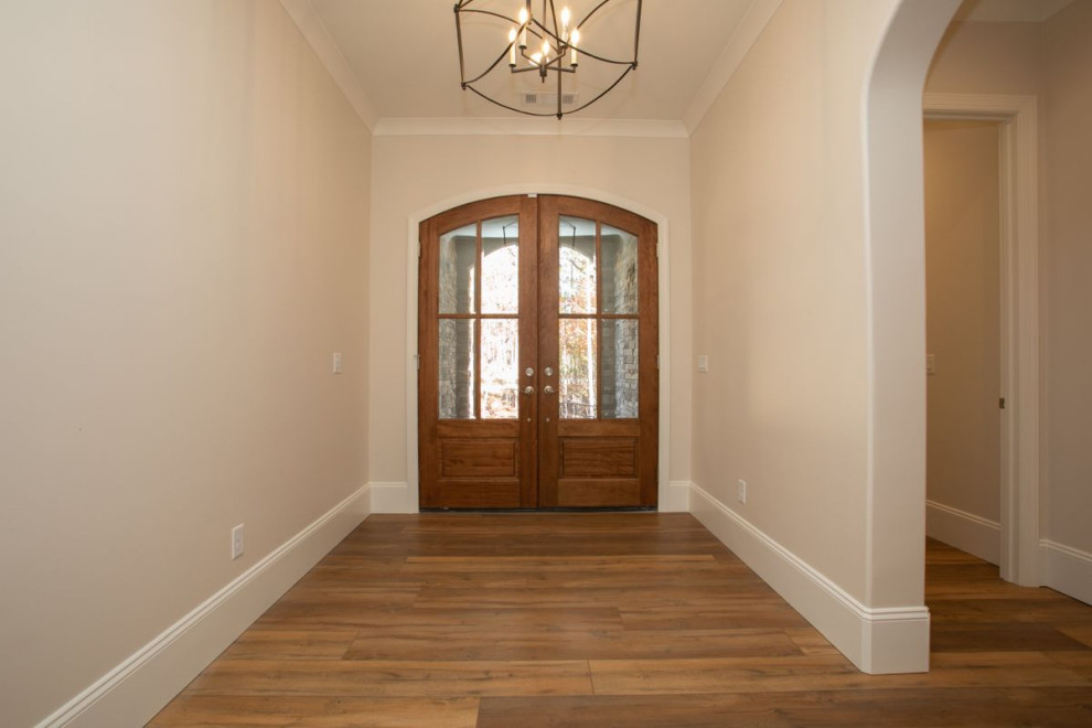 Design ideas for a transitional entryway in Atlanta with a double front door.