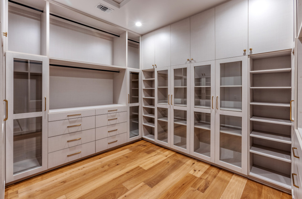 Custom Walk In Closet with Glass-Front Cabinets & Built In Drawers | French Coun