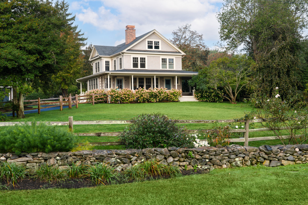 Example of a cottage exterior home design in Providence