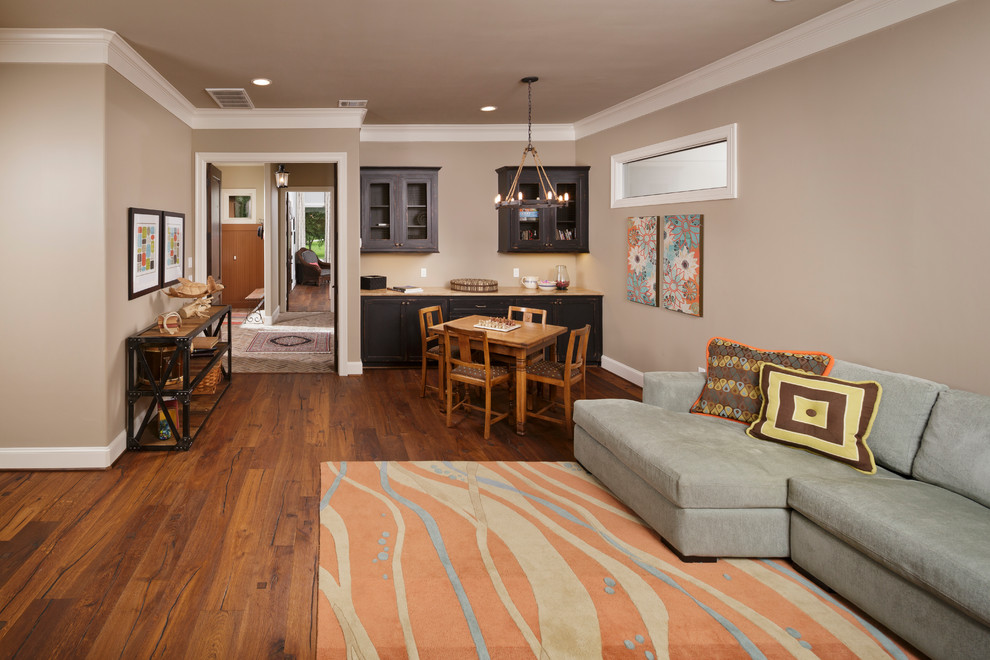 Game room - large mediterranean enclosed medium tone wood floor game room idea in Houston