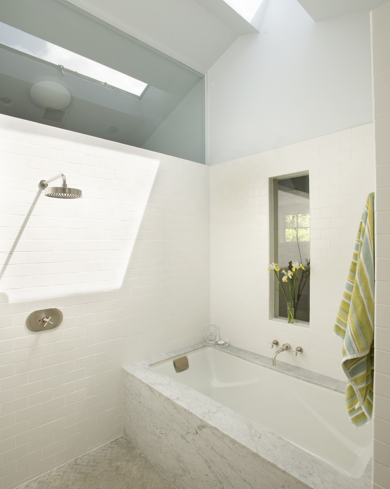 This is an example of a contemporary bathroom in San Francisco with an open shower and an open shower.