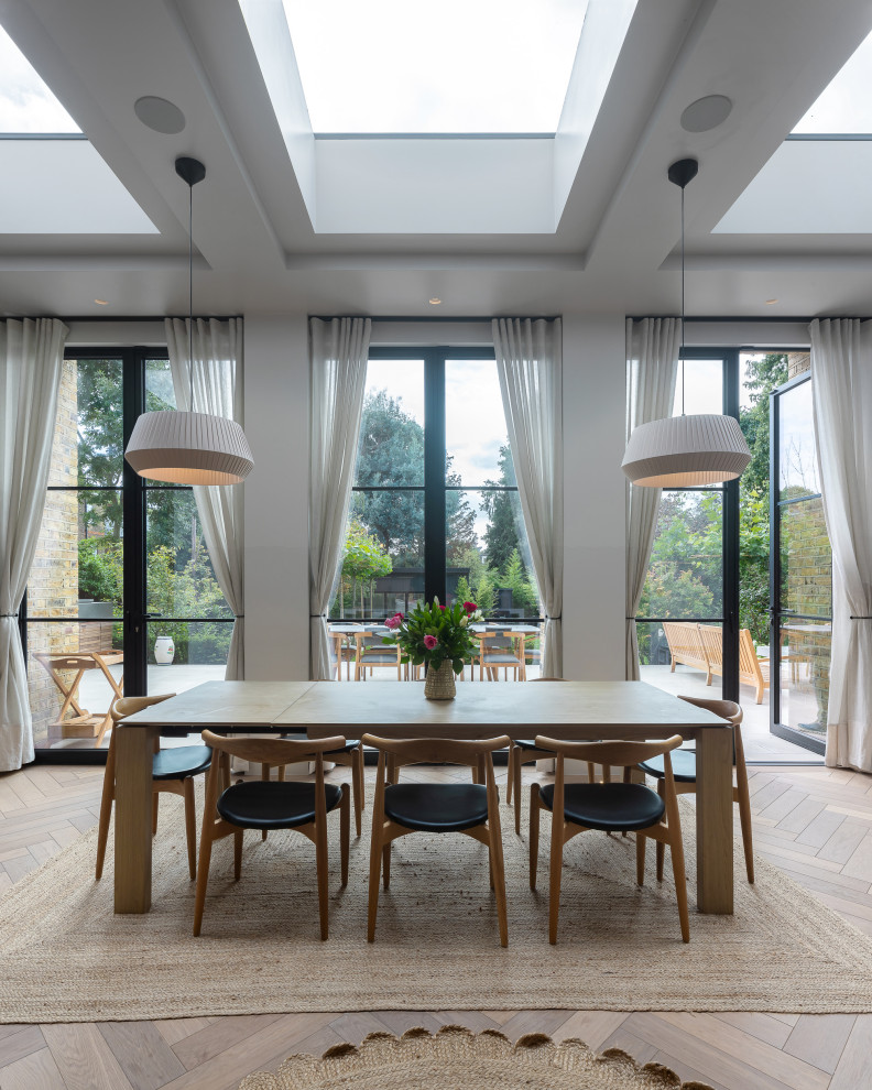 Transitional dining room in London.