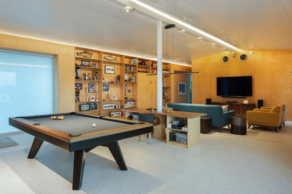 This is an example of a small contemporary games room in Other with a game room, concrete flooring, a wall mounted tv, grey floors, a timber clad ceiling and wood walls.