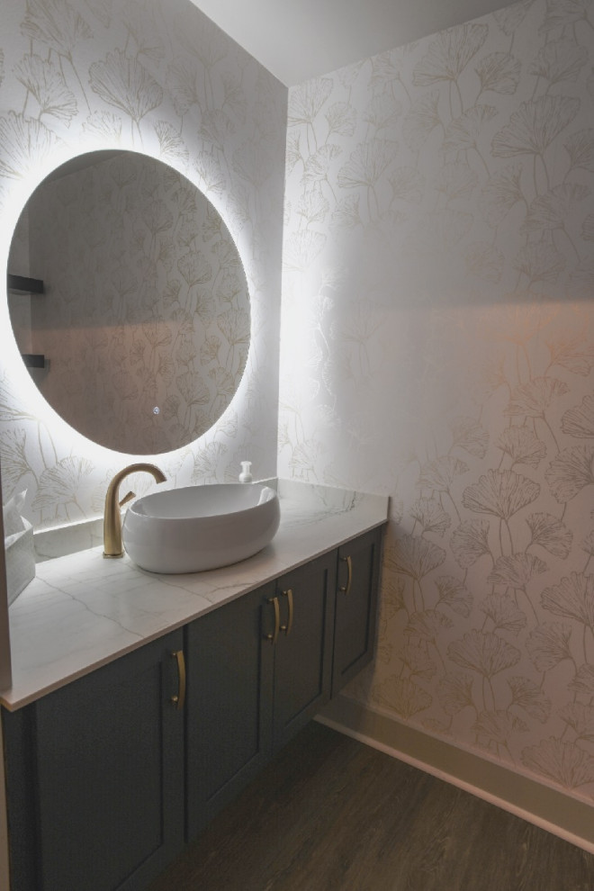 This is an example of a transitional powder room in Atlanta.