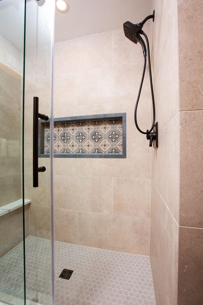 This is an example of a mid-sized country master bathroom in Other with recessed-panel cabinets, blue cabinets, an alcove shower, a two-piece toilet, beige tile, porcelain tile, beige walls, porcelain floors, an undermount sink, engineered quartz benchtops, multi-coloured floor, a sliding shower screen, white benchtops, a niche, a double vanity and a built-in vanity.