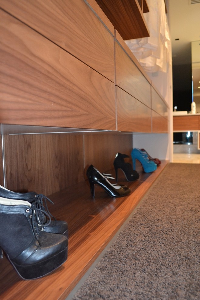 Photo of a contemporary storage and wardrobe in Perth.