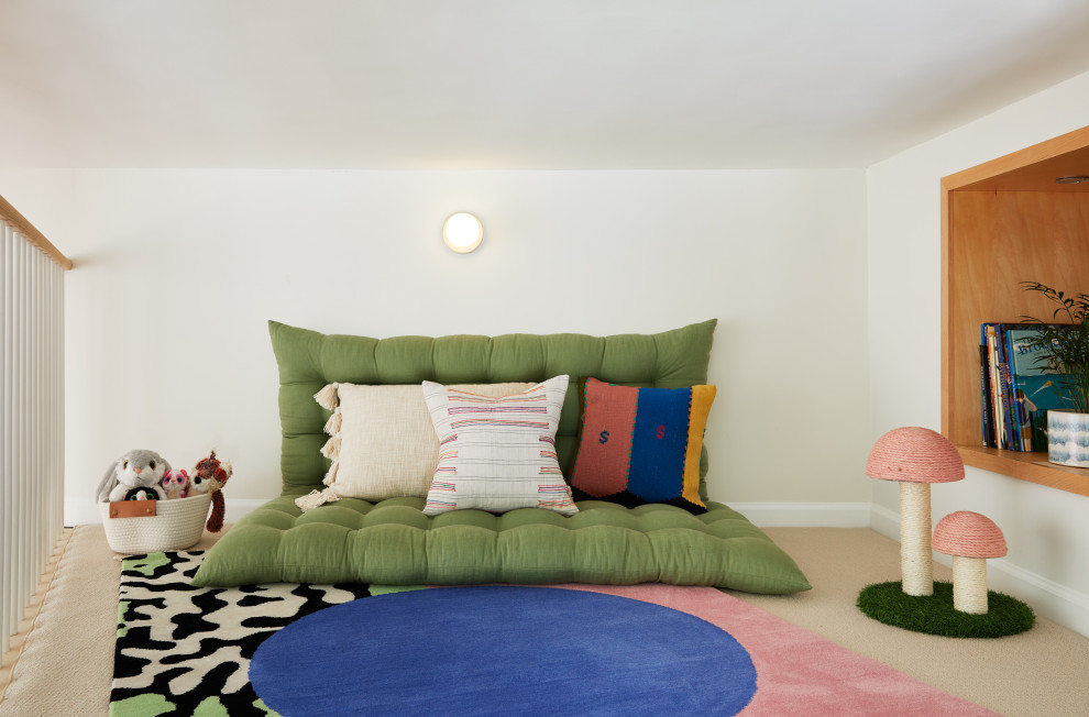 Design ideas for a contemporary gender neutral kids' bedroom in Austin with white walls, carpet and beige floors.