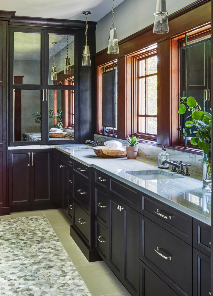 This is an example of an arts and crafts master bathroom in Chicago with recessed-panel cabinets, grey cabinets, multi-coloured tile, grey walls, marble floors, an undermount sink, quartzite benchtops, multi-coloured floor, a hinged shower door, white benchtops, a double vanity and a built-in vanity.