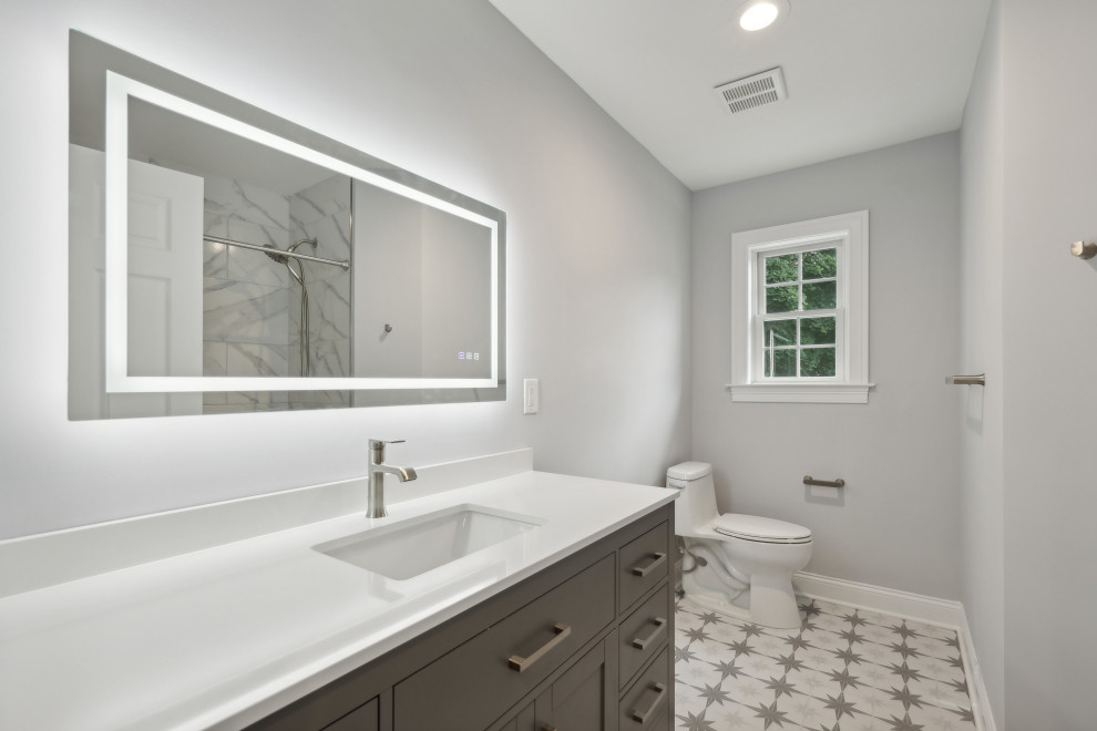 Bathroom with LED Mirror and Star Tile Floor