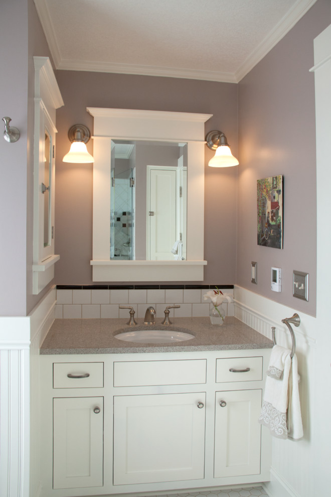 Mid-sized arts and crafts 3/4 bathroom in Portland with an undermount sink, shaker cabinets, white cabinets, engineered quartz benchtops, an alcove shower, a two-piece toilet, white tile, subway tile, purple walls and ceramic floors.