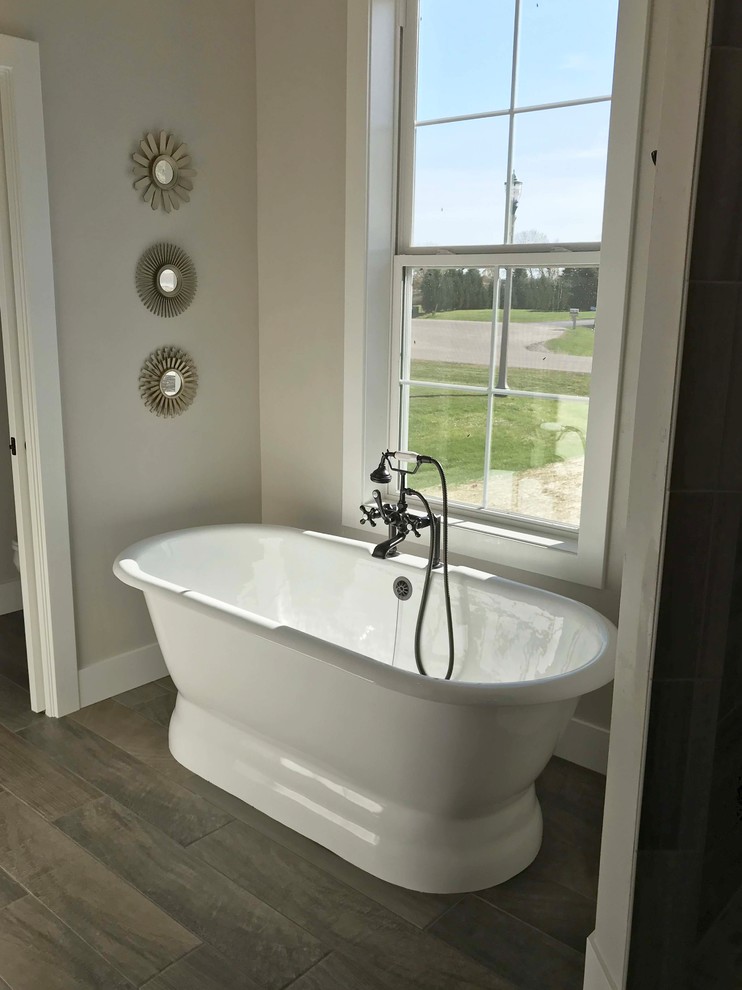 Design ideas for a large arts and crafts master bathroom in Other with shaker cabinets, white cabinets, a drop-in tub, an open shower, a one-piece toilet, beige walls, vinyl floors, an undermount sink, granite benchtops, beige floor and an open shower.