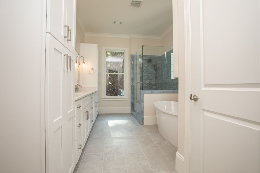 Transitional bathroom in Atlanta with a freestanding tub.