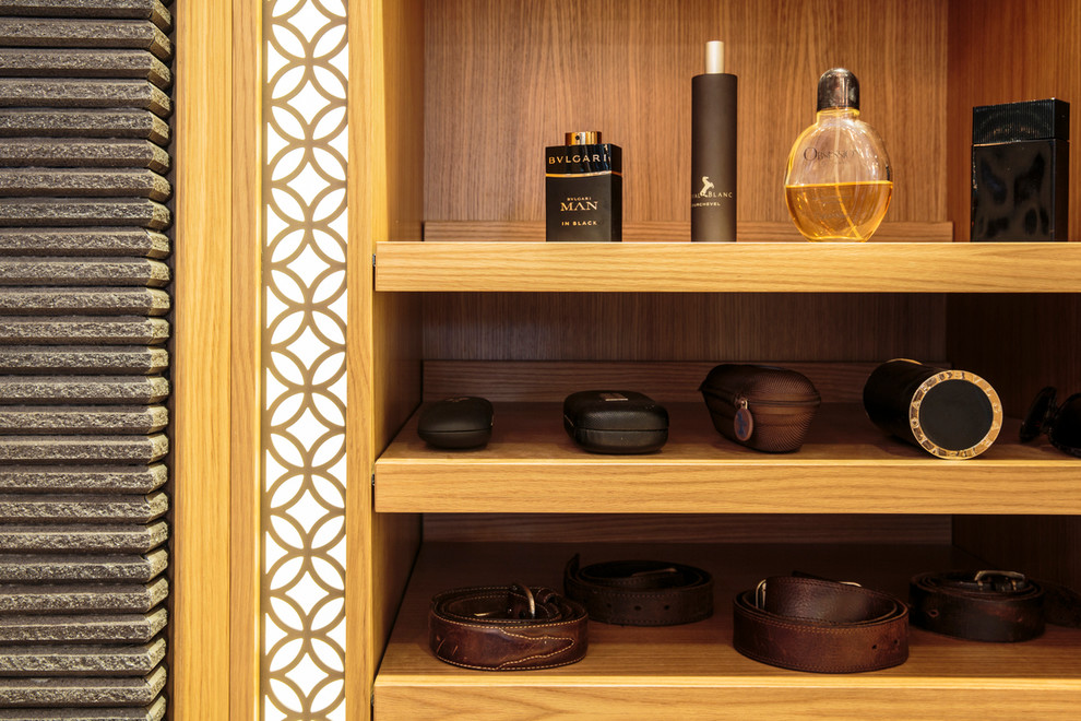 Design ideas for a large contemporary walk-in wardrobe in Sunshine Coast.