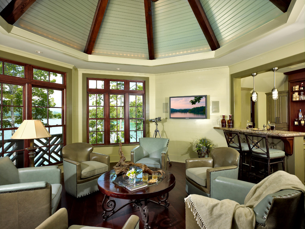 Large transitional dark wood floor sunroom photo with no fireplace