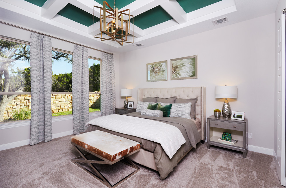 Design ideas for a large contemporary master bedroom in Austin with beige walls, carpet and beige floor.