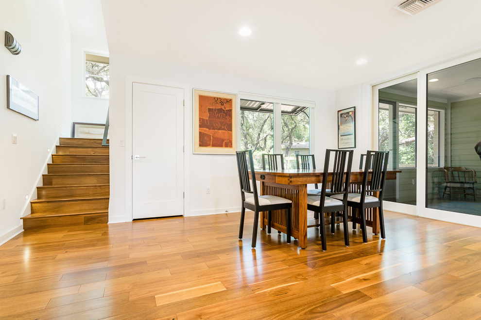Example of a transitional dining room design in Austin