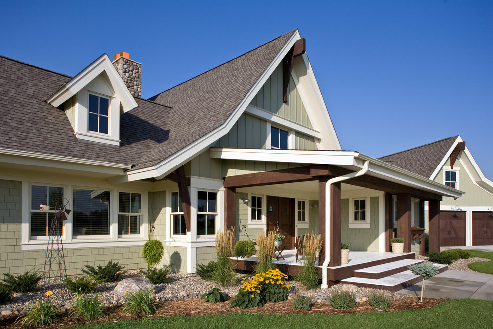 Design ideas for a country exterior in Minneapolis with wood siding.