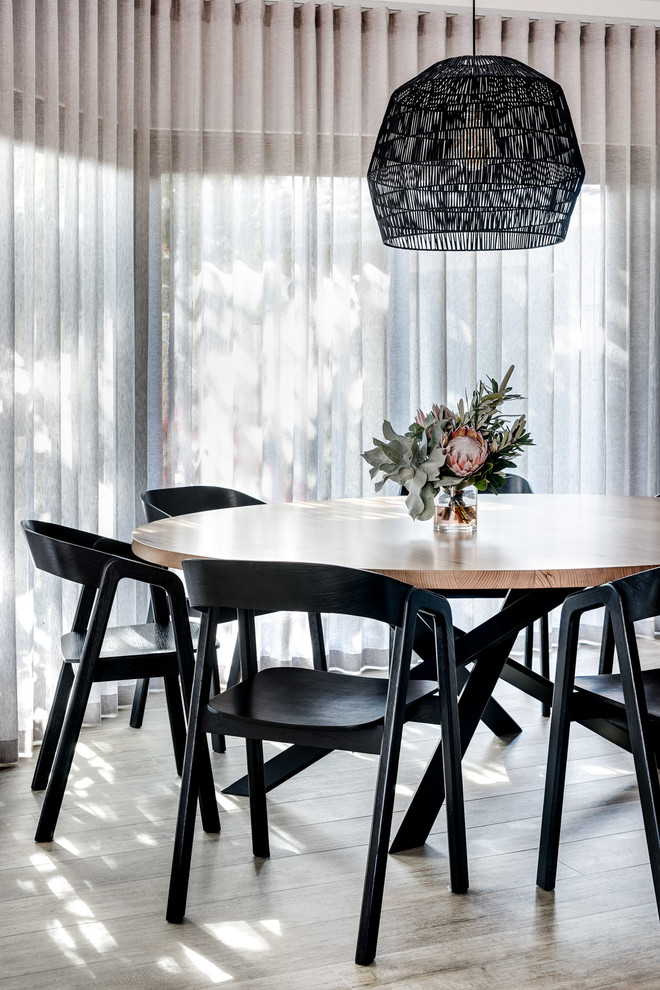 This is an example of a mid-sized contemporary dining room in Perth.
