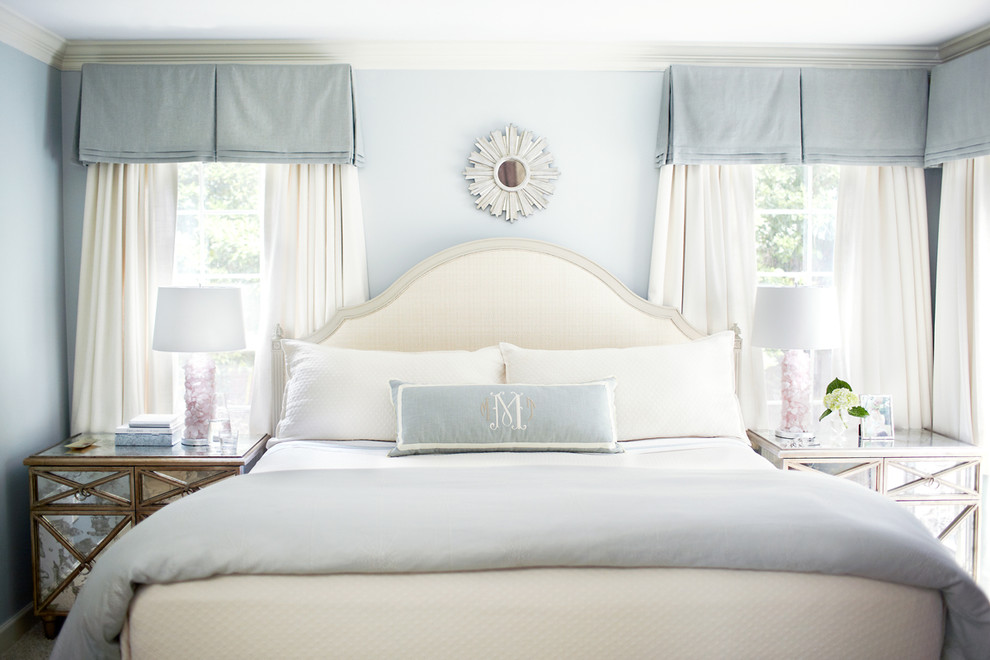 Design ideas for a transitional bedroom in Raleigh with blue walls.