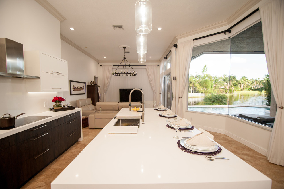 Design ideas for a large contemporary l-shaped eat-in kitchen in Miami with an undermount sink, flat-panel cabinets, brown cabinets, quartz benchtops, white splashback, stone slab splashback, stainless steel appliances and with island.