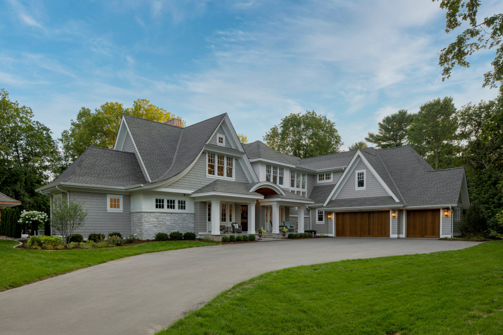 Grand Haven Custom Home - Custom Home in Cape-Cod Style with cedar shakes and stained exterior doors.