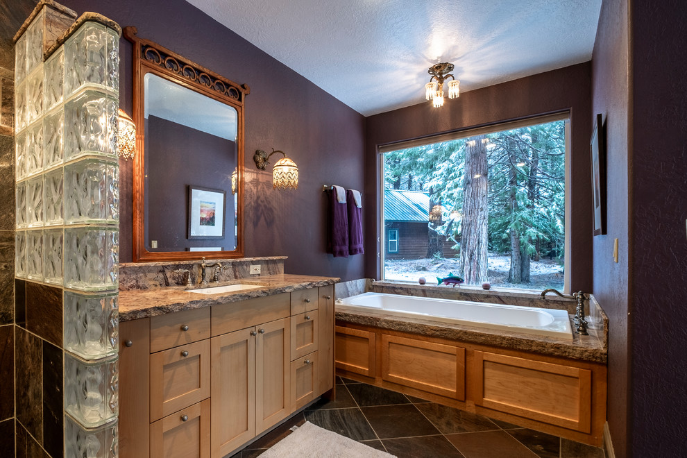 Photo of a mid-sized master bathroom in Other with recessed-panel cabinets, light wood cabinets, an alcove tub, a corner shower, white tile, purple walls, an undermount sink, marble benchtops, an open shower and purple benchtops.