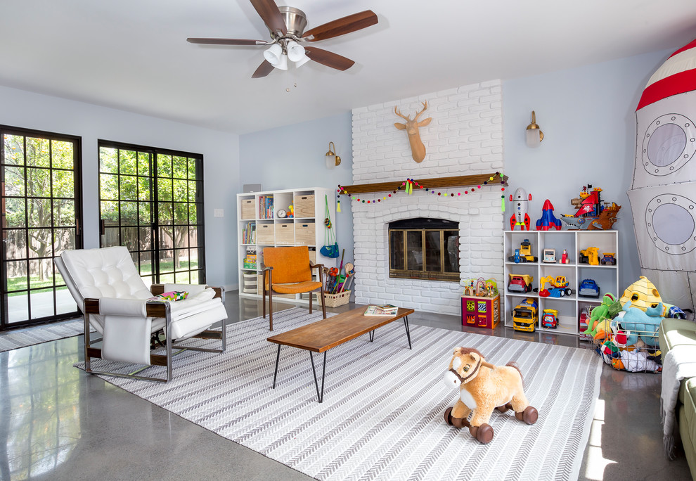 This is an example of a large midcentury enclosed family room in Los Angeles with a game room, grey walls, concrete floors, a standard fireplace, a brick fireplace surround, no tv and grey floor.
