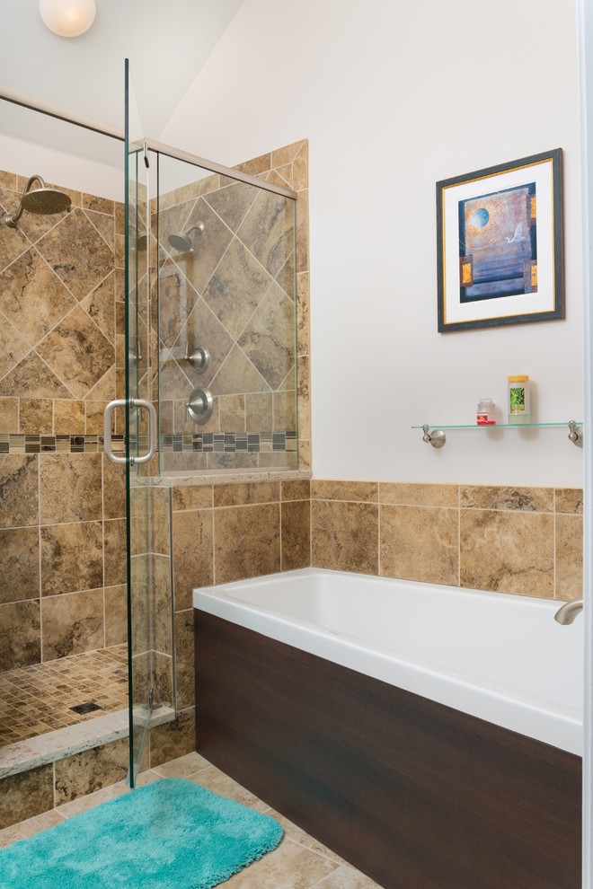Mid-sized modern master bathroom in Philadelphia with raised-panel cabinets, brown cabinets, an alcove tub, a corner shower, a two-piece toilet, multi-coloured tile, ceramic tile, beige walls, ceramic floors, a drop-in sink, granite benchtops, multi-coloured floor and a hinged shower door.