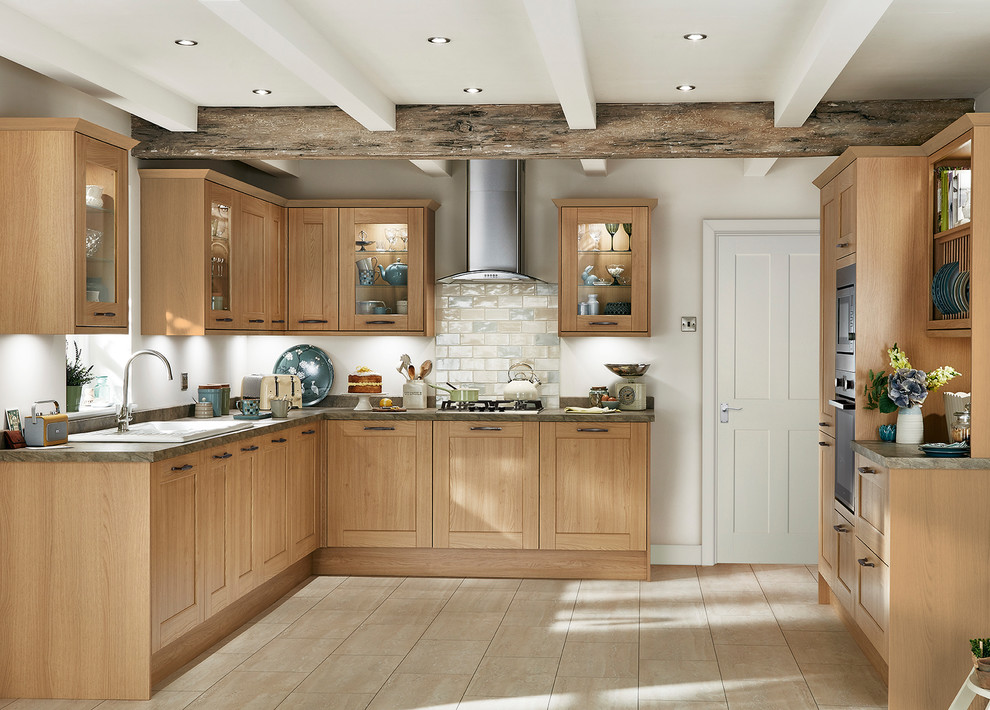 Inspiration for a traditional u-shaped separate kitchen in Other with an integrated sink, shaker cabinets, light wood cabinets, wood benchtops, stone tile splashback and panelled appliances.