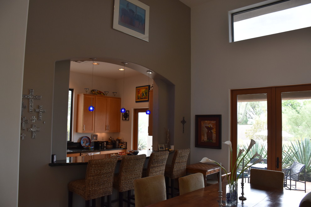 Inspiration for a mid-sized transitional travertine floor and beige floor great room remodel in Phoenix with gray walls and no fireplace