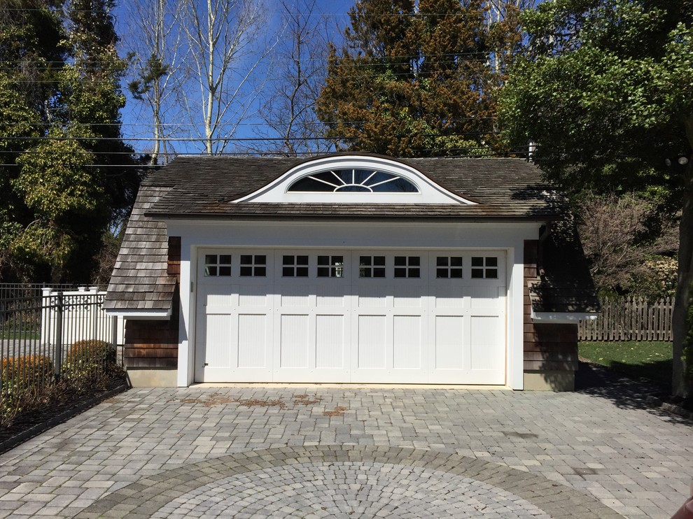 This is an example of a mid-sized beach style garage in New York.