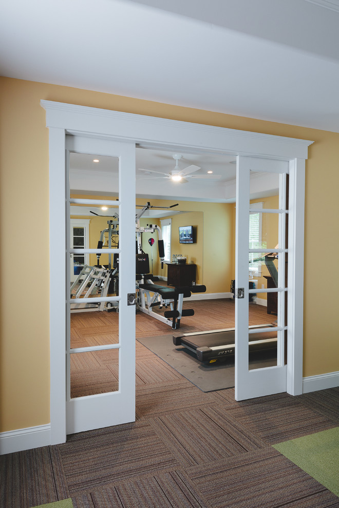 Photo of a beach style multipurpose gym in Atlanta with yellow walls and carpet.