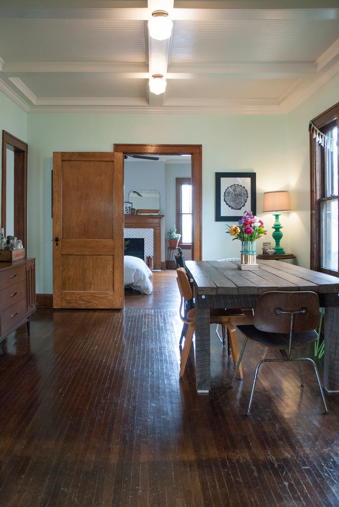 Example of a mid-sized eclectic dark wood floor kitchen/dining room combo design in Columbus with green walls and no fireplace