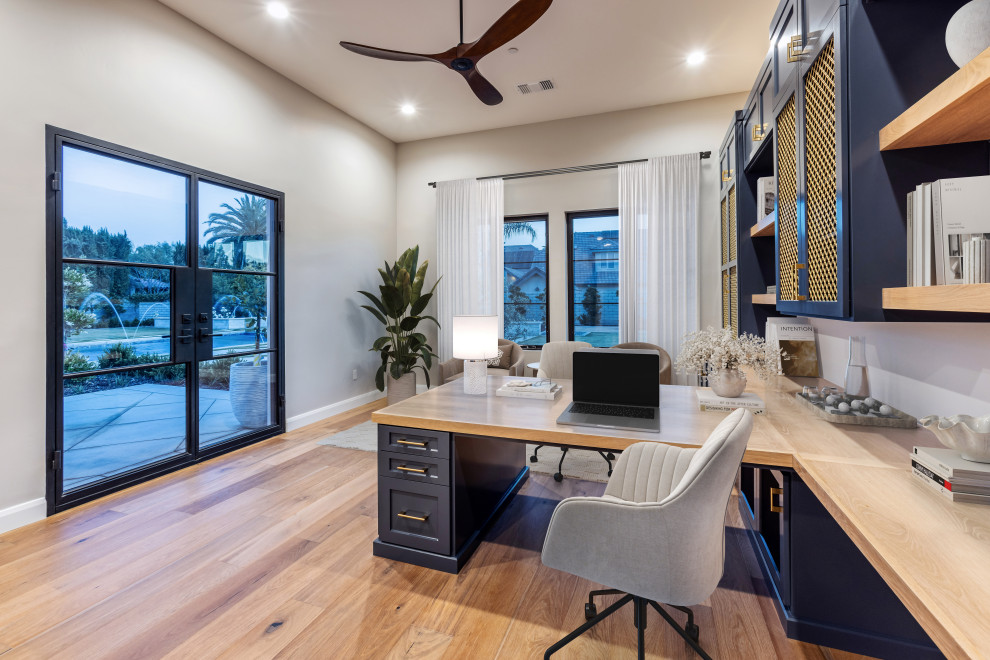 Built In Wood Desk & Black-Framed Glass Doors Home Office | French Country Trans
