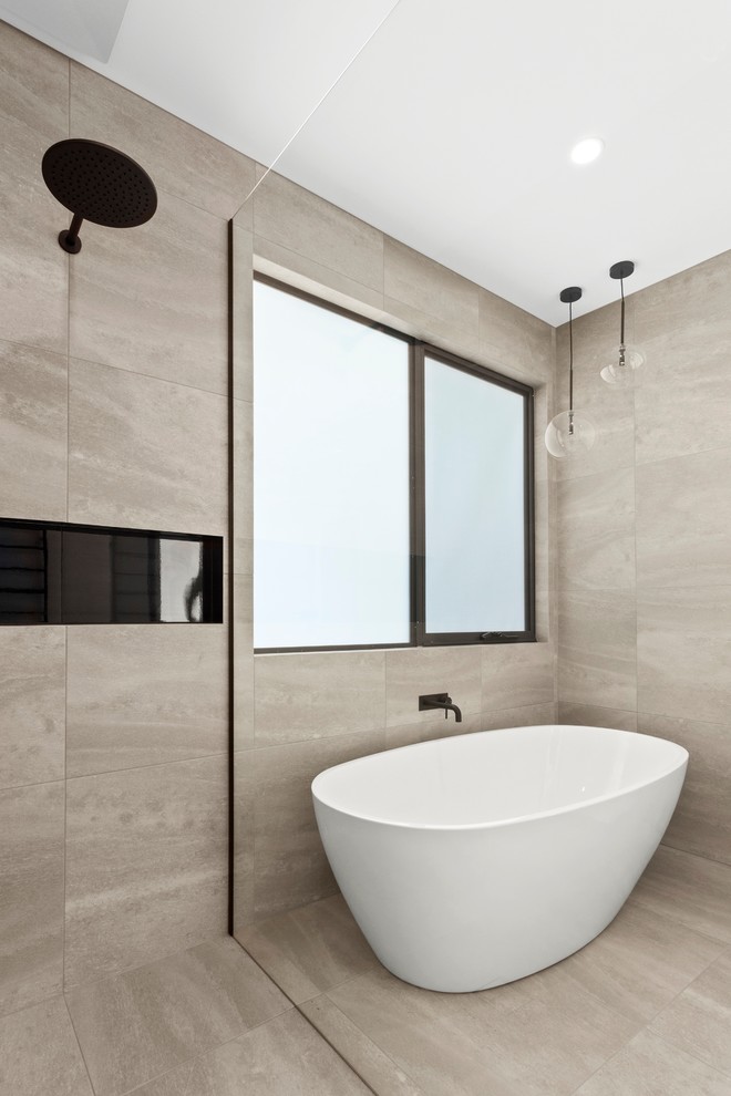 This is an example of a mid-sized contemporary 3/4 wet room bathroom in Geelong with porcelain tile and porcelain floors.